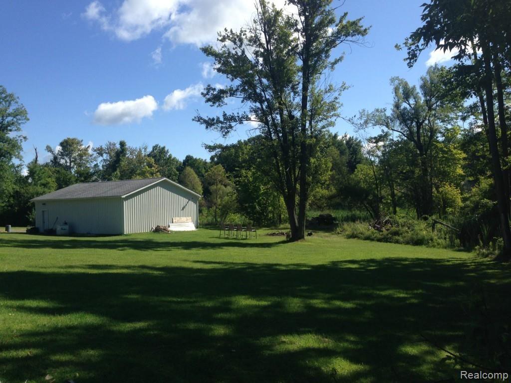 1731 West Leonard Road Leonard, MI 48367 - Photo 32 of 78 Rear Property line