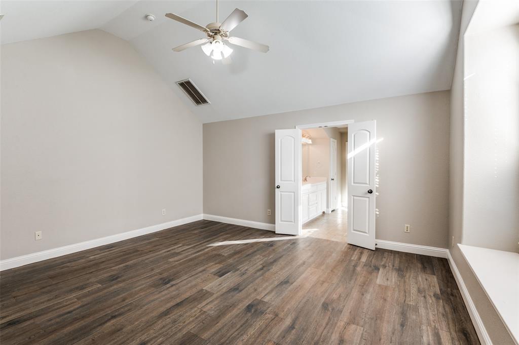 3230 Adirondack Lane Frisco, TX 75033 - Photo 18 of 27 a view of an empty room and wooden floor