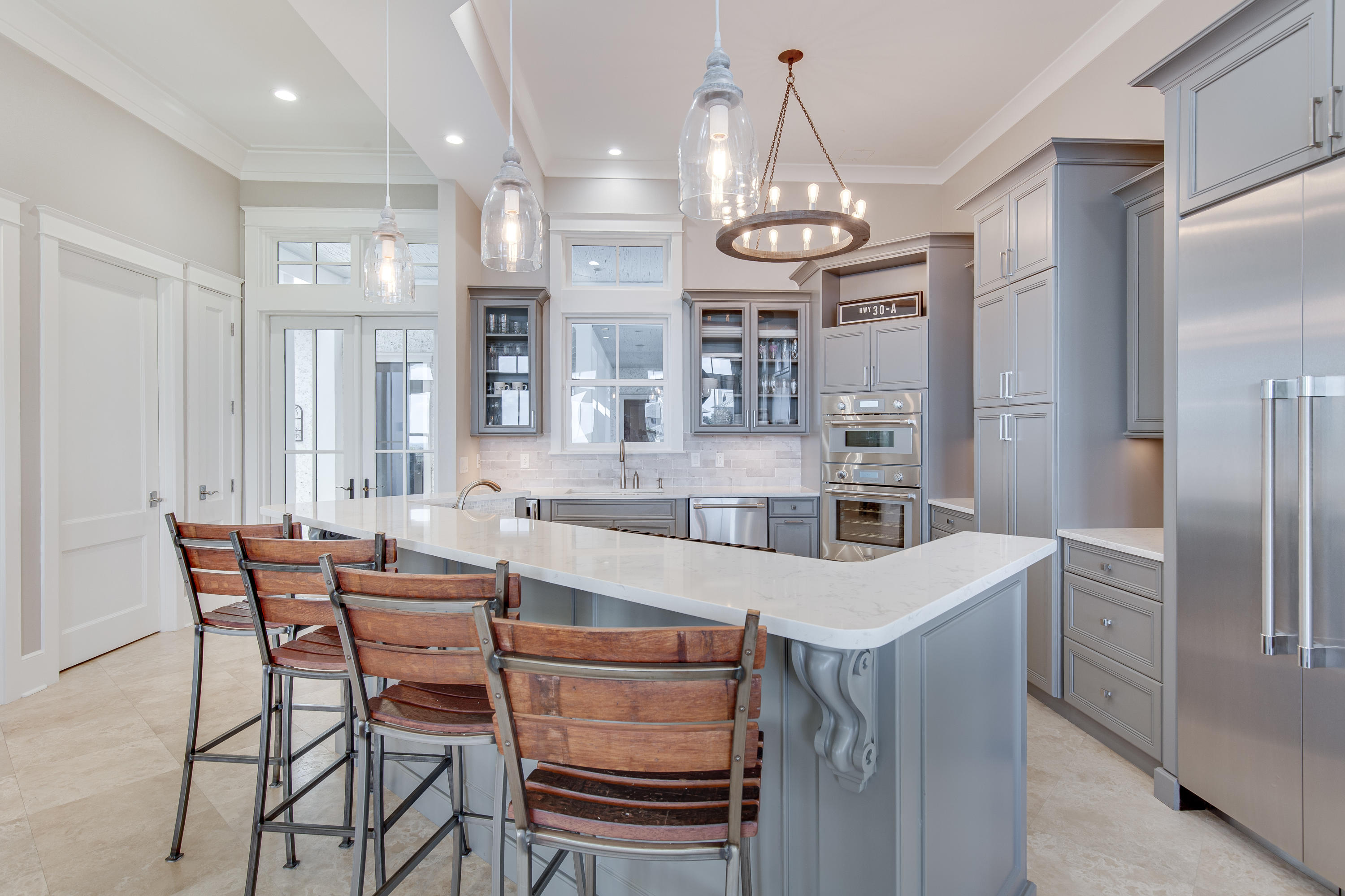 201 West Bermuda Drive Santa Rosa Beach, FL 32459 - Photo 16 of 56 a kitchen with stainless steel appliances granite countertop a kitchen island a stove and a cabinets