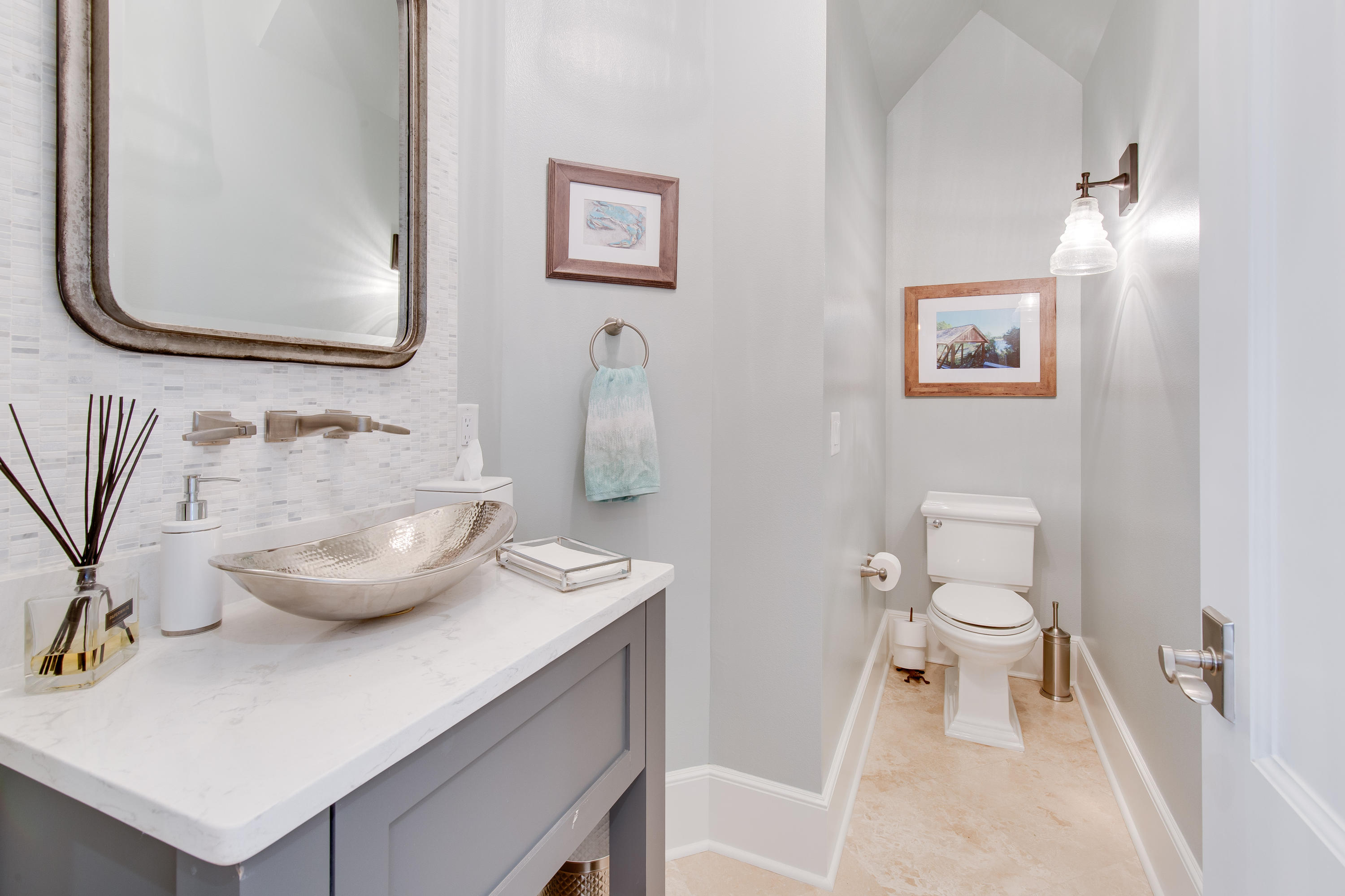 201 West Bermuda Drive Santa Rosa Beach, FL 32459 - Photo 29 of 56 a bathroom with a sink and a mirror