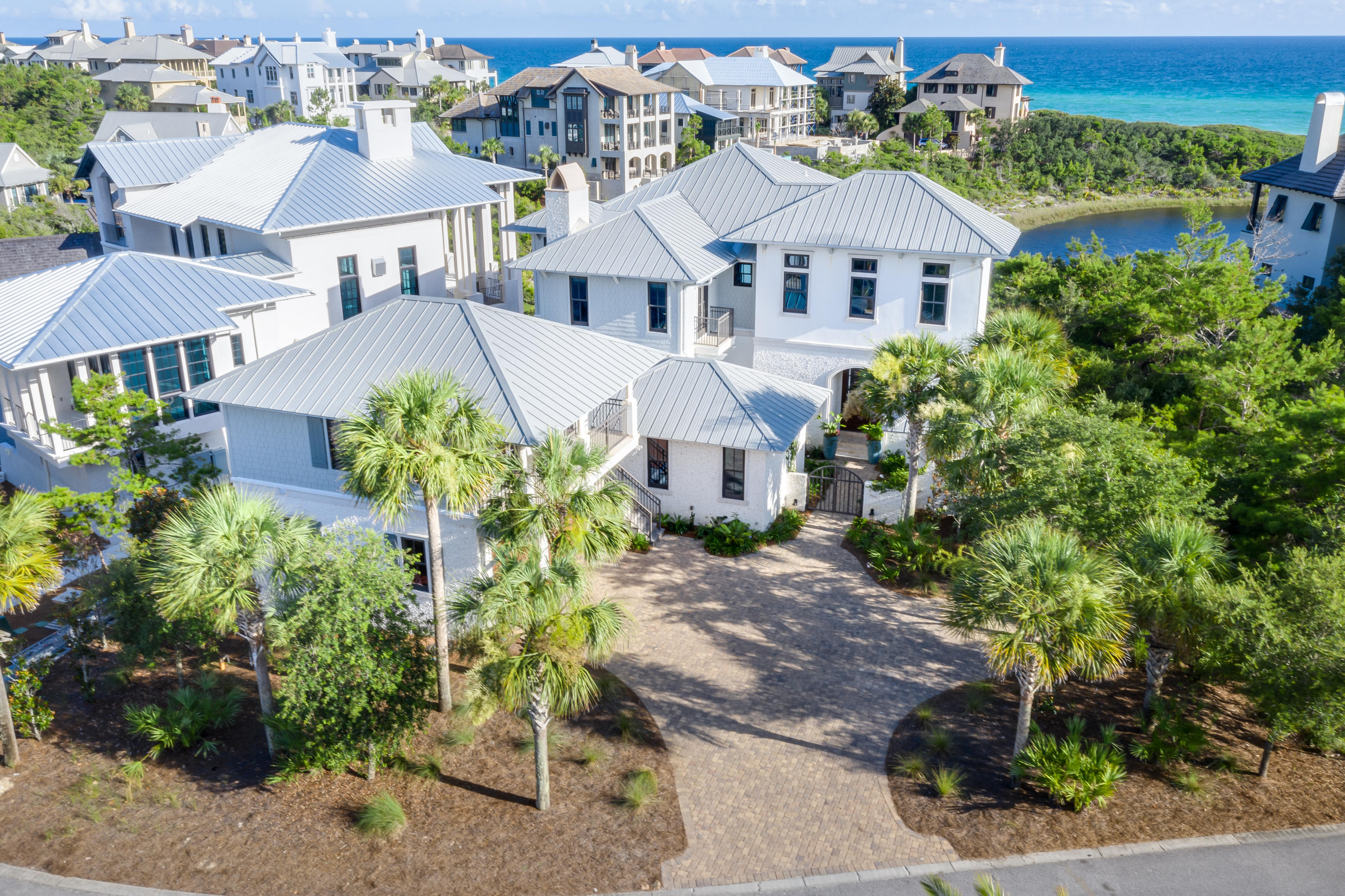 201 West Bermuda Drive Santa Rosa Beach, FL 32459 - Photo 36 of 56 an aerial view of a house with a yard and a garden