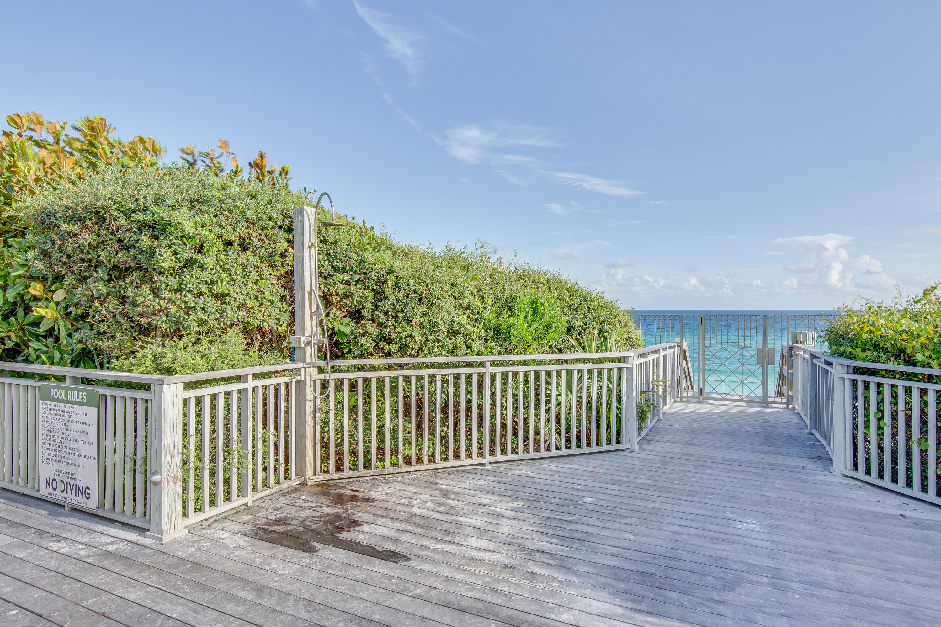 201 West Bermuda Drive Santa Rosa Beach, FL 32459 - Photo 50 of 56 a view of a deck with wooden floor and fence