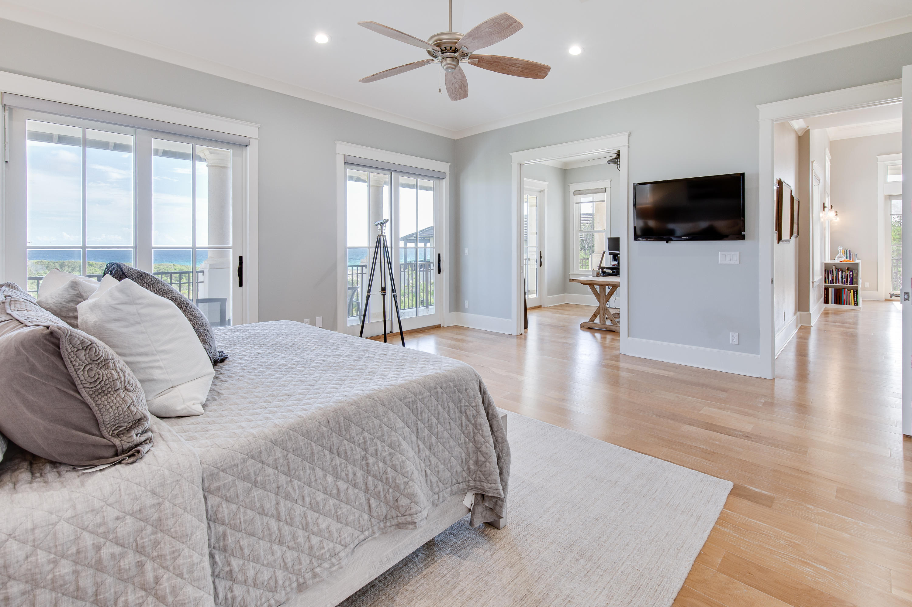 201 West Bermuda Drive Santa Rosa Beach, FL 32459 - Photo 7 of 56 a bedroom with a bed and a flat screen tv