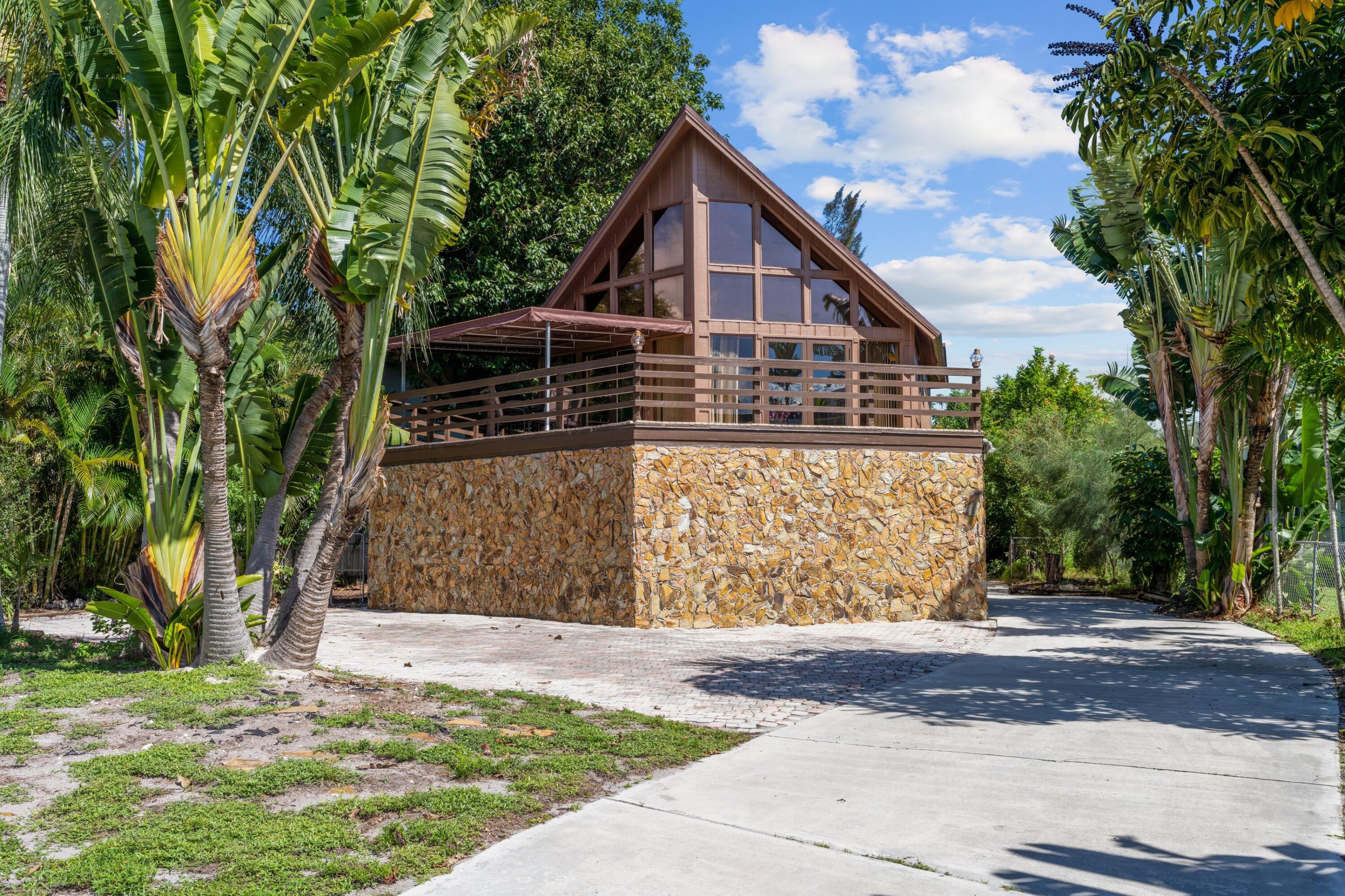 7620 East Country Club Boulevard Boca Raton, FL 33487 - Photo 3 of 27 Exterior Front