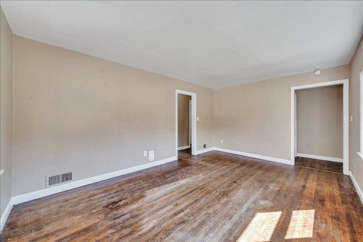 3121 Plantation Road Northeast Roanoke, VA 24012 - Photo 25 of 44 a view of an empty room with wooden floor