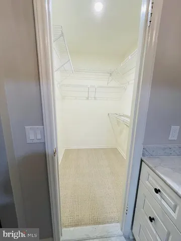 a bathroom with a sink a mirror and a toilet