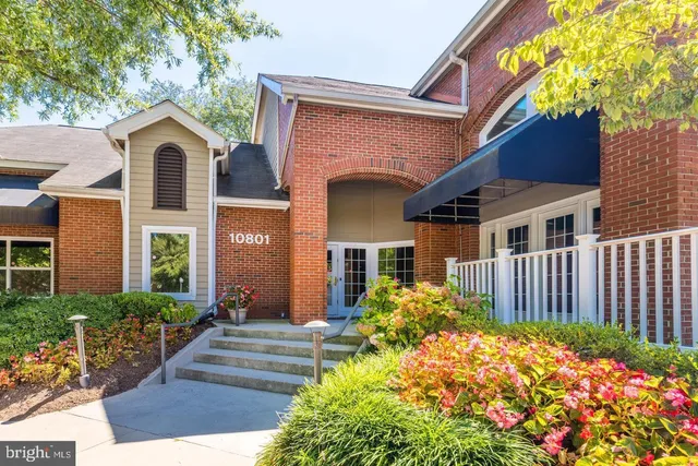 a kitchen with a table chairs and a fireplace