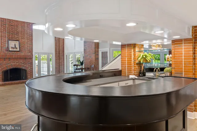 a view of living room with furniture and a flat screen tv