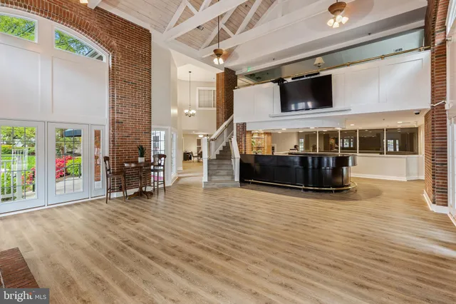 a view of dinning room with wooden floor