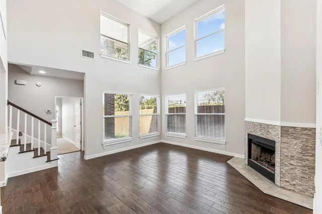 a view of a small space with wooden floor