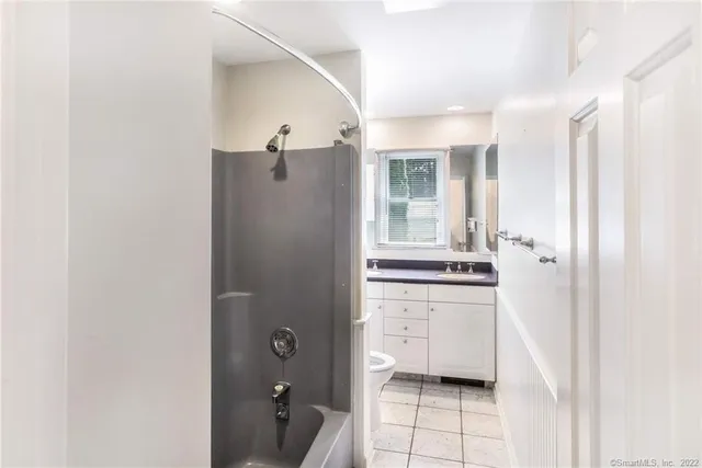 a kitchen with stainless steel appliances a refrigerator and a stove