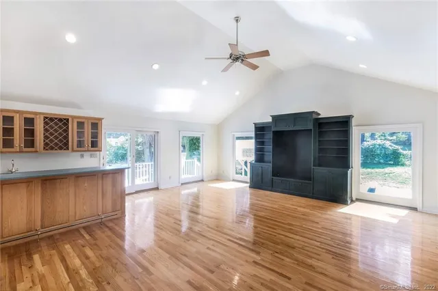 a view of a kitchen with a sink and a window