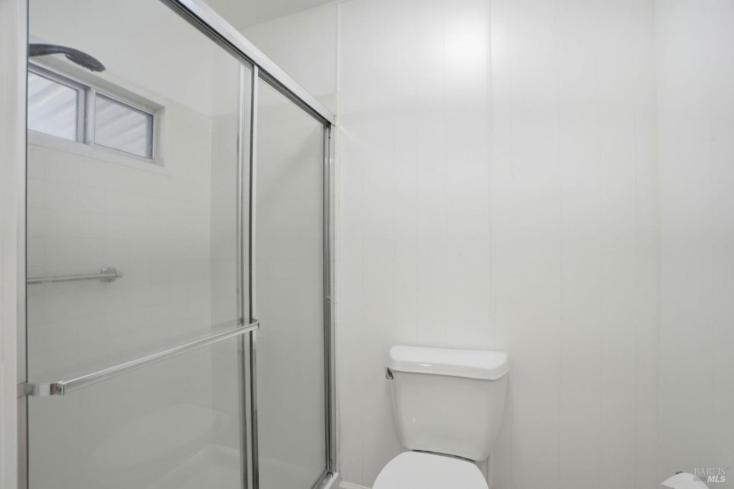 59 Colonial Park Drive Santa Rosa, CA 95403 - Photo 23 of 35 a bathroom with a toilet and a shower