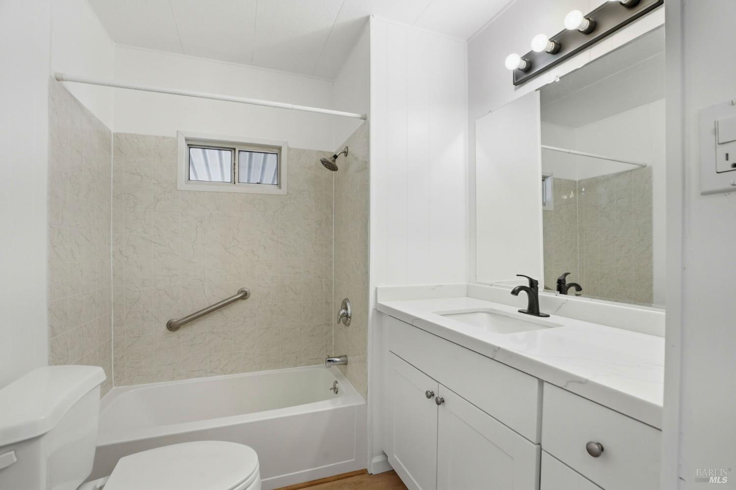 59 Colonial Park Drive Santa Rosa, CA 95403 - Photo 24 of 35 a bathroom with a sink a toilet and shower