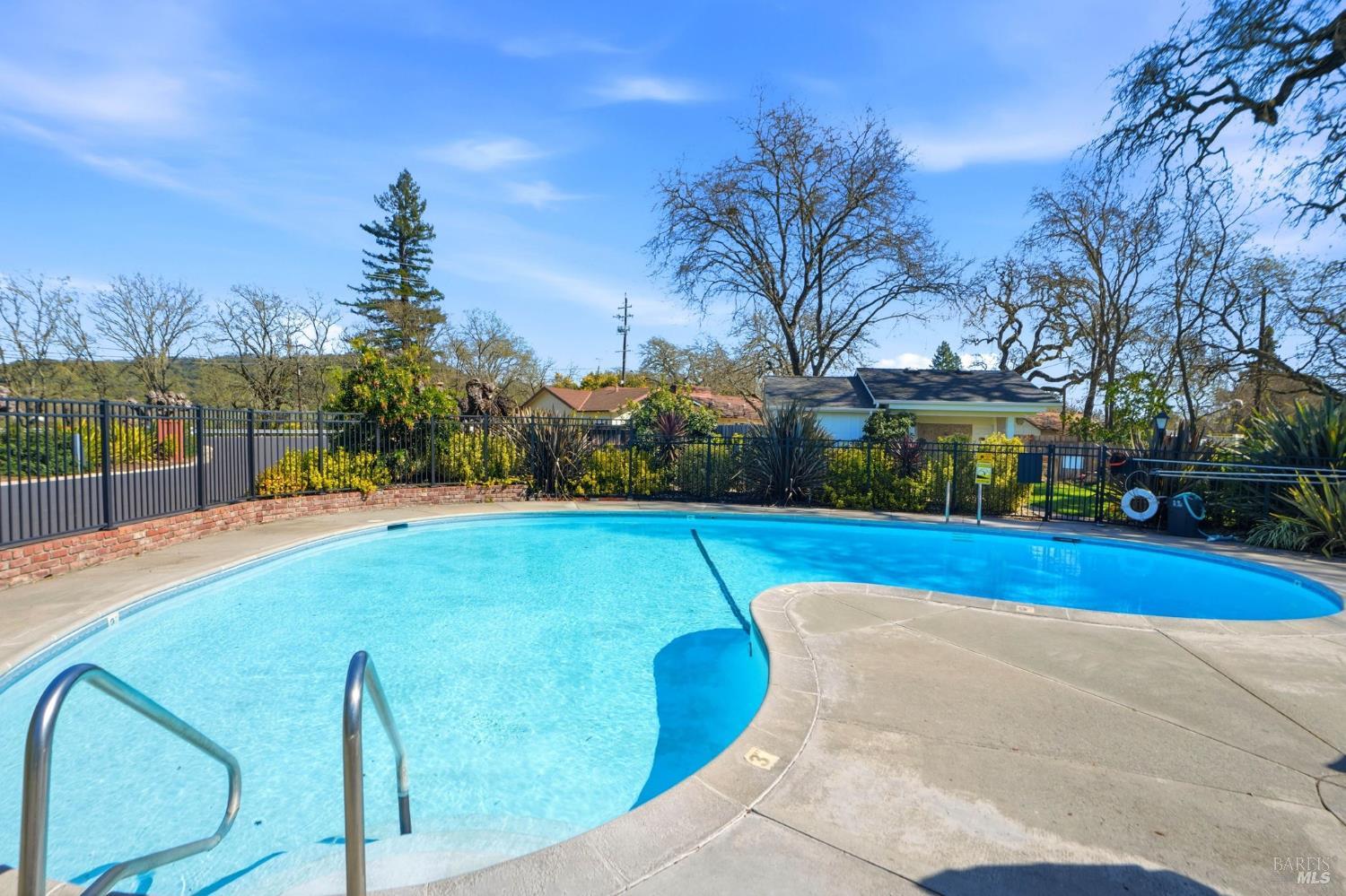 59 Colonial Park Drive Santa Rosa, CA 95403 - Photo 34 of 35 a view of swimming pool with outdoor seating and yard in back