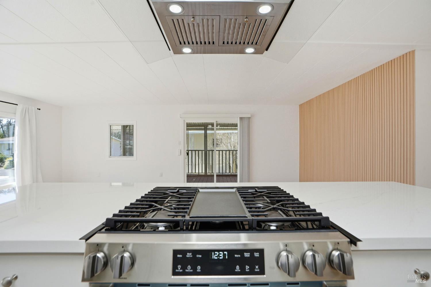 59 Colonial Park Drive Santa Rosa, CA 95403 - Photo 10 of 35 a stove top oven sitting inside of a kitchen