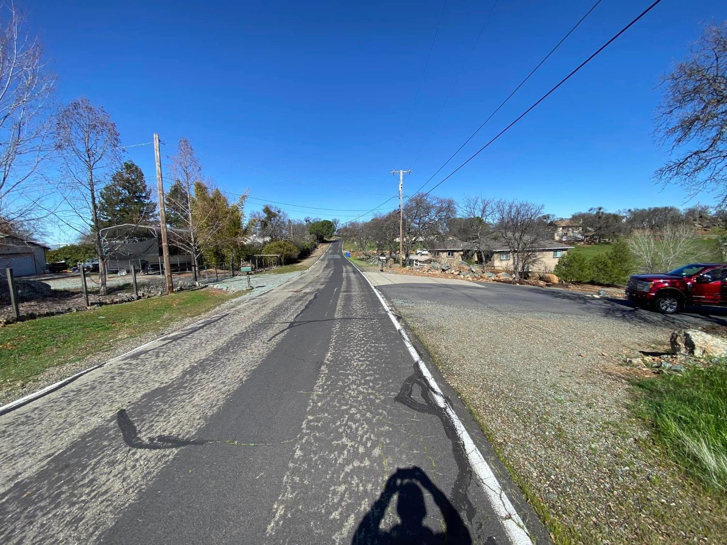 4241 Grisham Road Valley Springs, CA 95252 - Photo 22 of 22 a view of a street with a building in the background