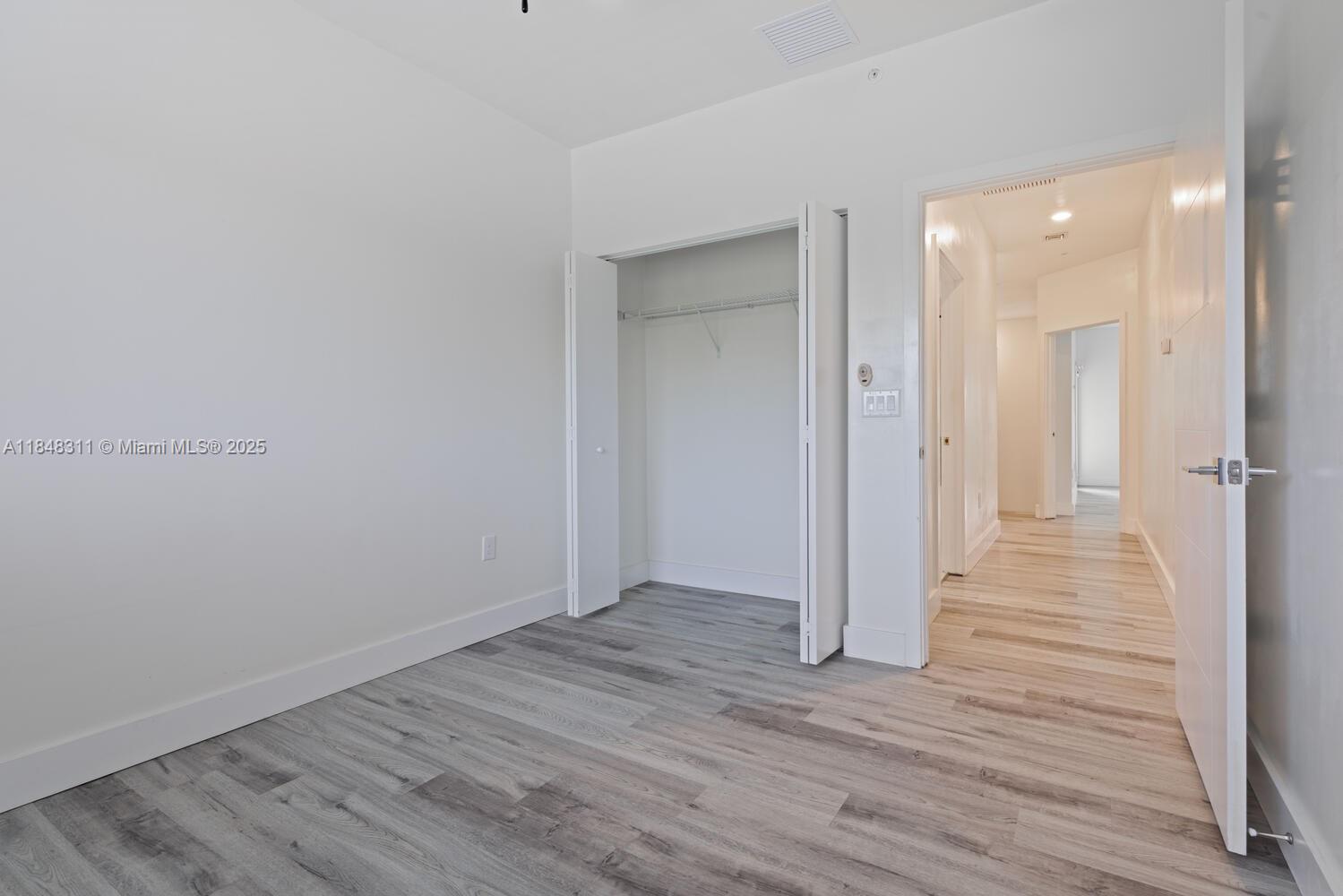 891 Northwest 45th Terrace Plantation, FL 33317 - Photo 20 of 33 a view of a hallway with wooden floor