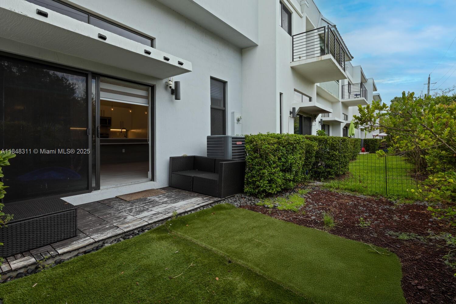 891 Northwest 45th Terrace Plantation, FL 33317 - Photo 22 of 33 a view of an house with backyard and porch