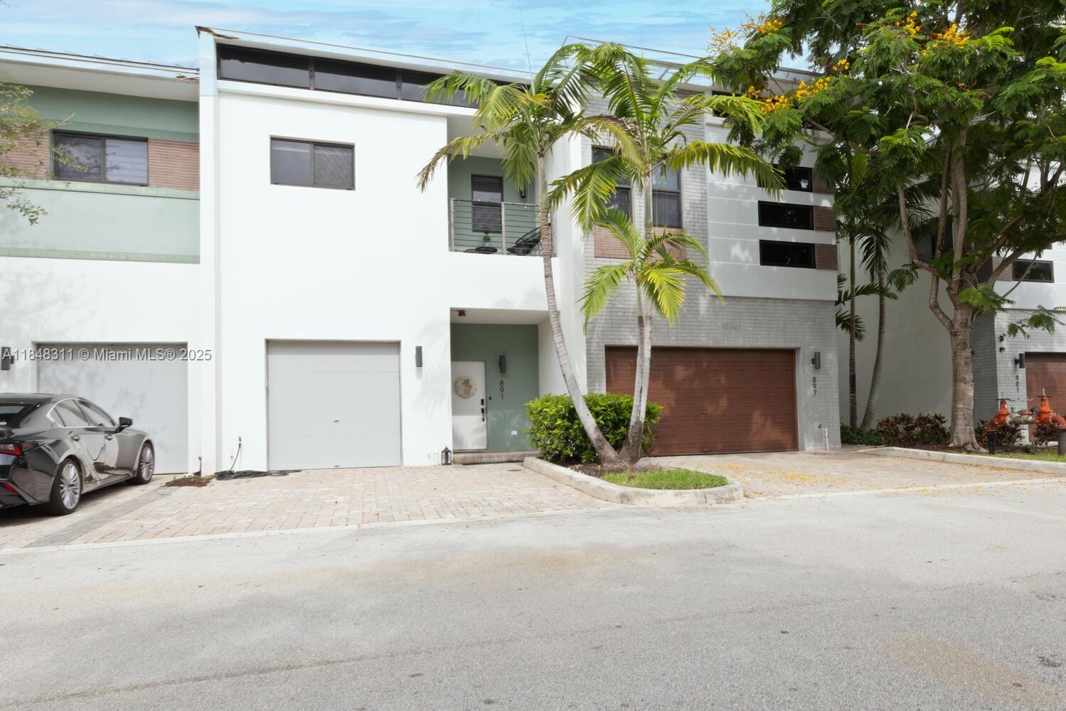 891 Northwest 45th Terrace Plantation, FL 33317 - Photo 23 of 33 a front view of a house with a garage