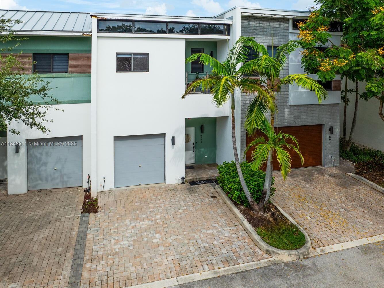 891 Northwest 45th Terrace Plantation, FL 33317 - Photo 24 of 33 a front view of a house with plants