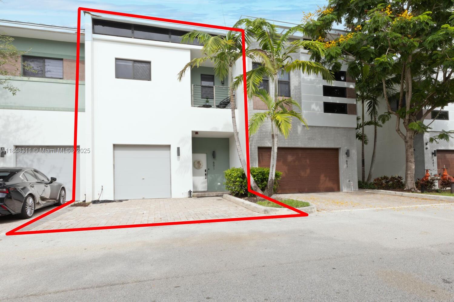 891 Northwest 45th Terrace Plantation, FL 33317 - Photo 25 of 33 a front view of a house with a garage