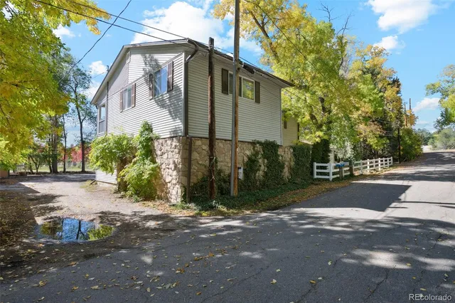 a view of a street with brick building in the background