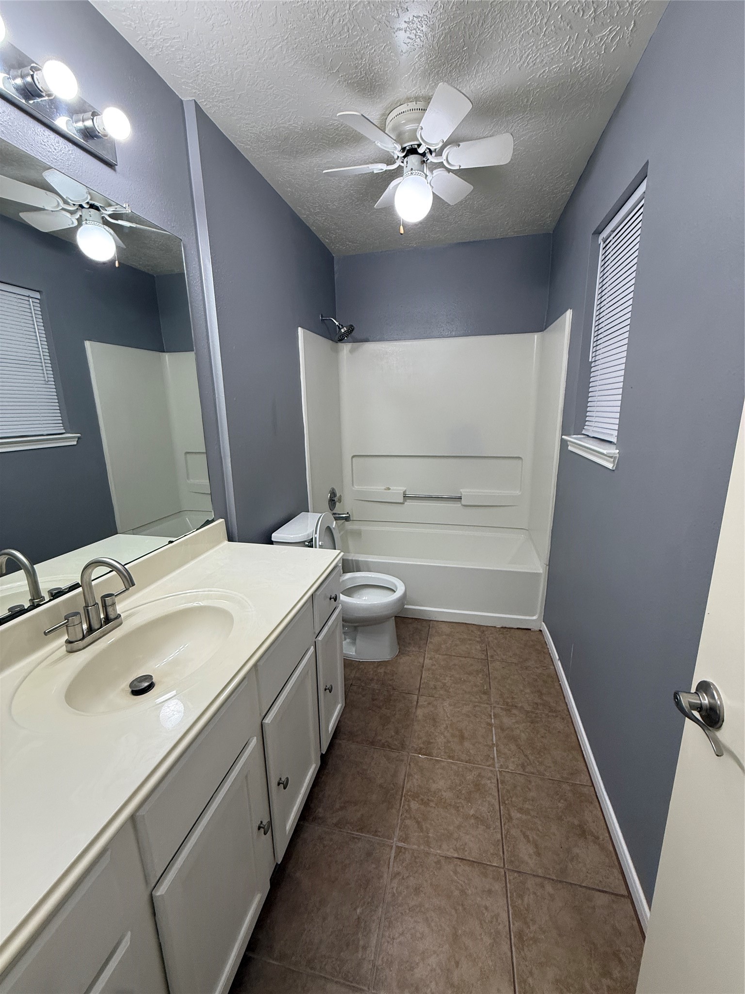 5026 Tealgate Drive Spring, TX 77373 - Photo 15 of 22 a bathroom with a sink a toilet and a mirror