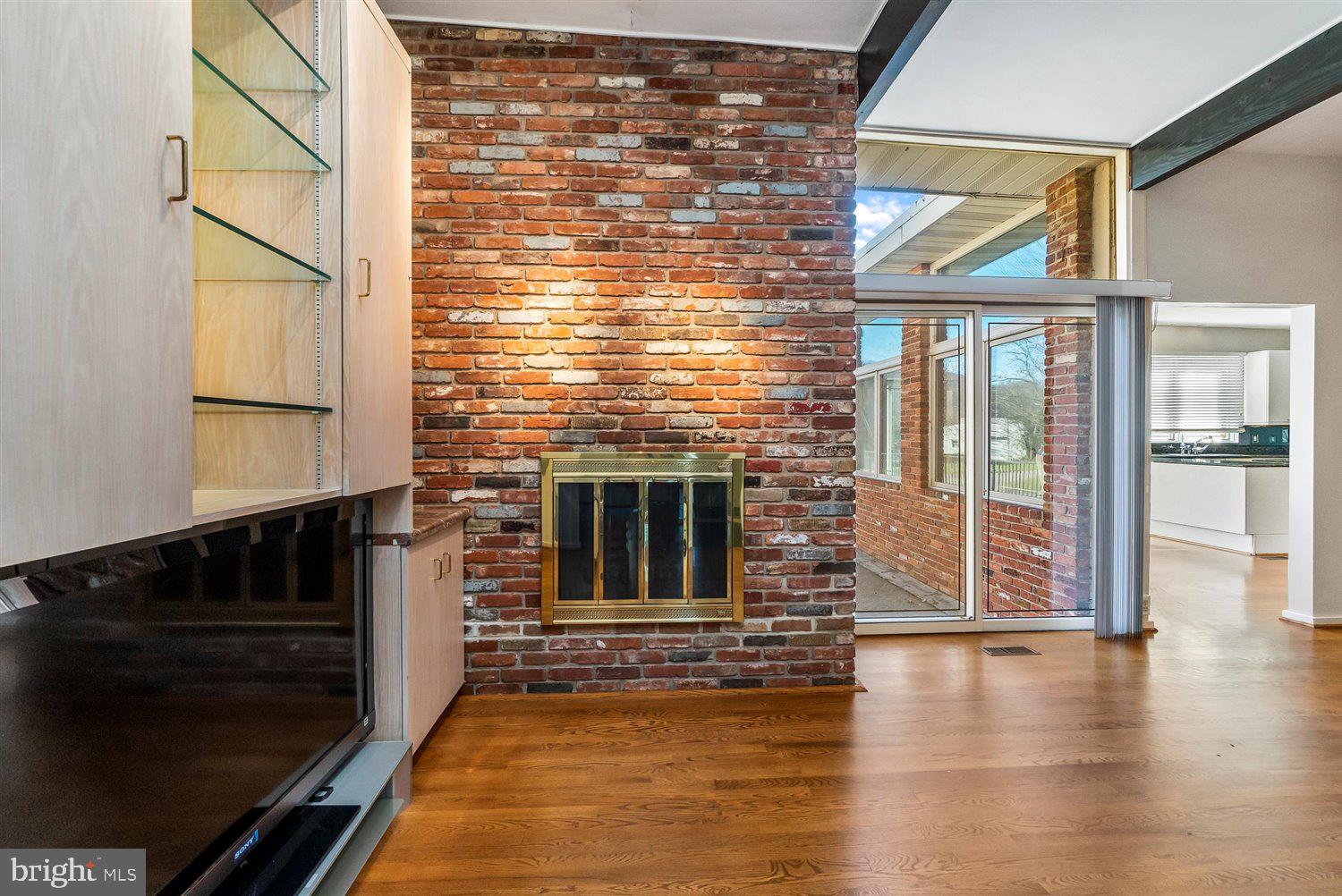 2040 Old Valley Road Stevenson, MD 21153 - Photo 14 of 82 wood burning fireplace with brick surround