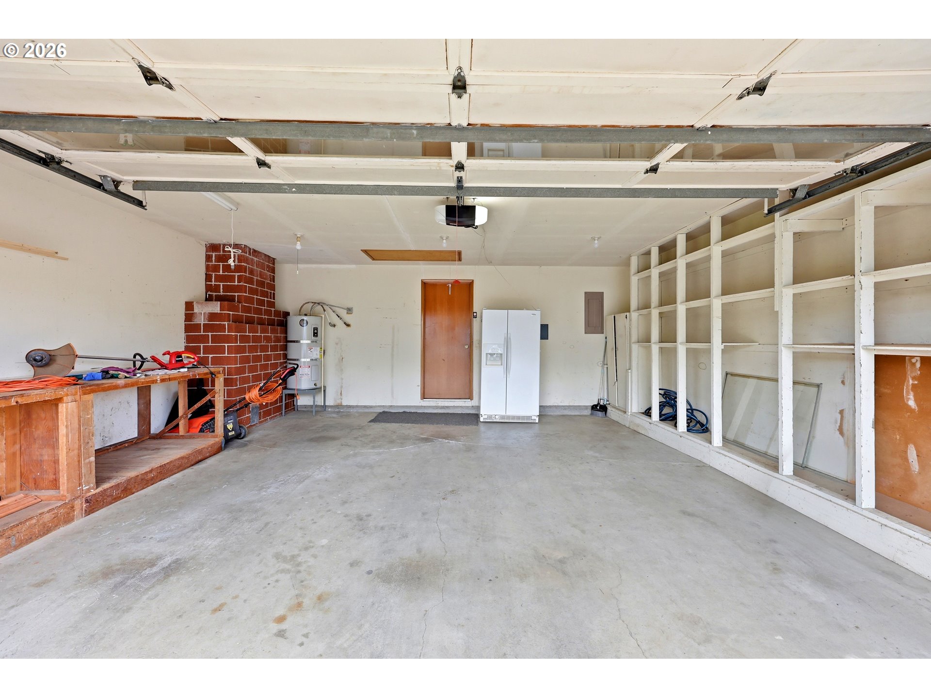 3003 Southeast 162nd Avenue Portland, OR 97236 - Photo 39 of 41 a view of an empty room with wooden floor