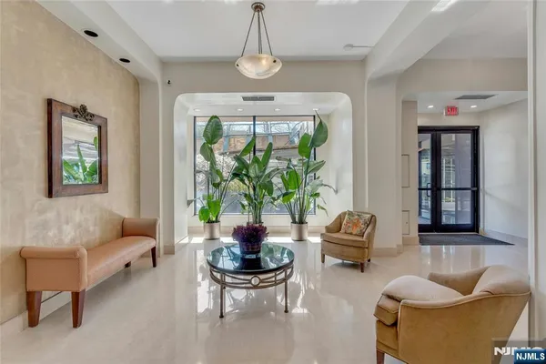 a view of a tree with a yard