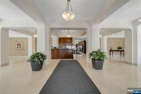 a room with furniture and a wooden floor