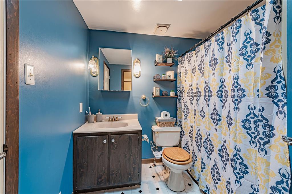 161 Seventh Street Extension Trafford, PA 15085 - Photo 15 of 23 a bathroom with a sink toilet and shower