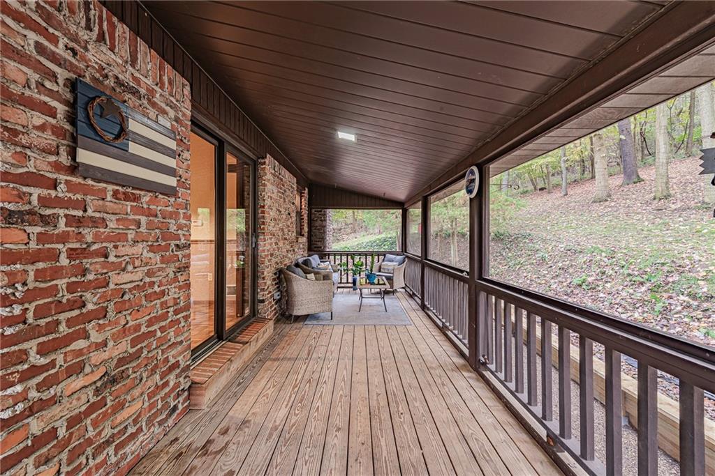 161 Seventh Street Extension Trafford, PA 15085 - Photo 19 of 23 a view of a balcony with wooden floor