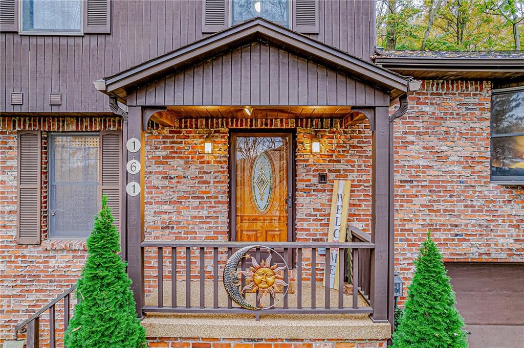 161 Seventh Street Extension Trafford, PA 15085 - Photo 3 of 23 a front view of a house with garden