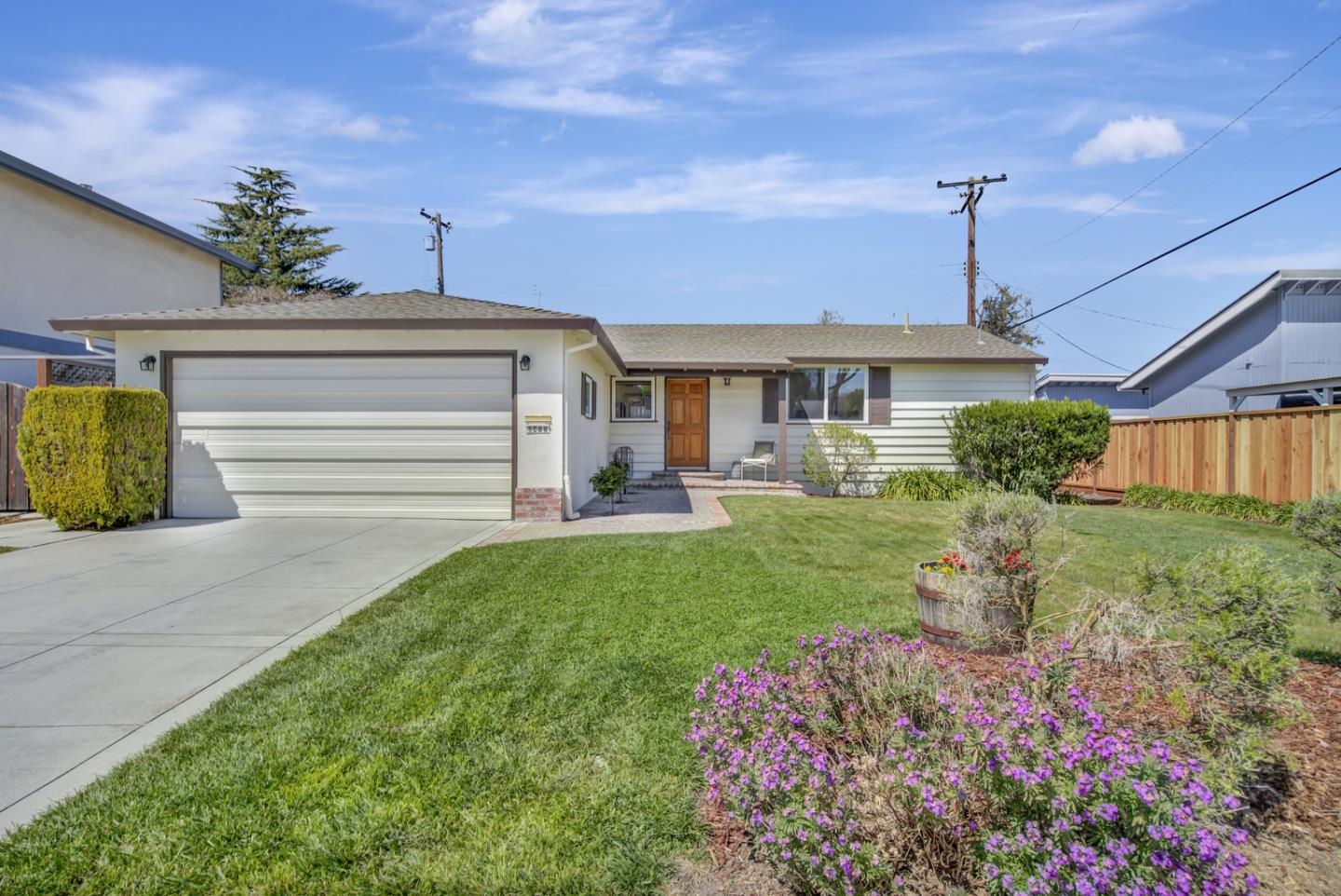 2417 Scanlan Place Santa Clara, CA 95050 - Photo 1 of 22 a front view of a house with a yard
