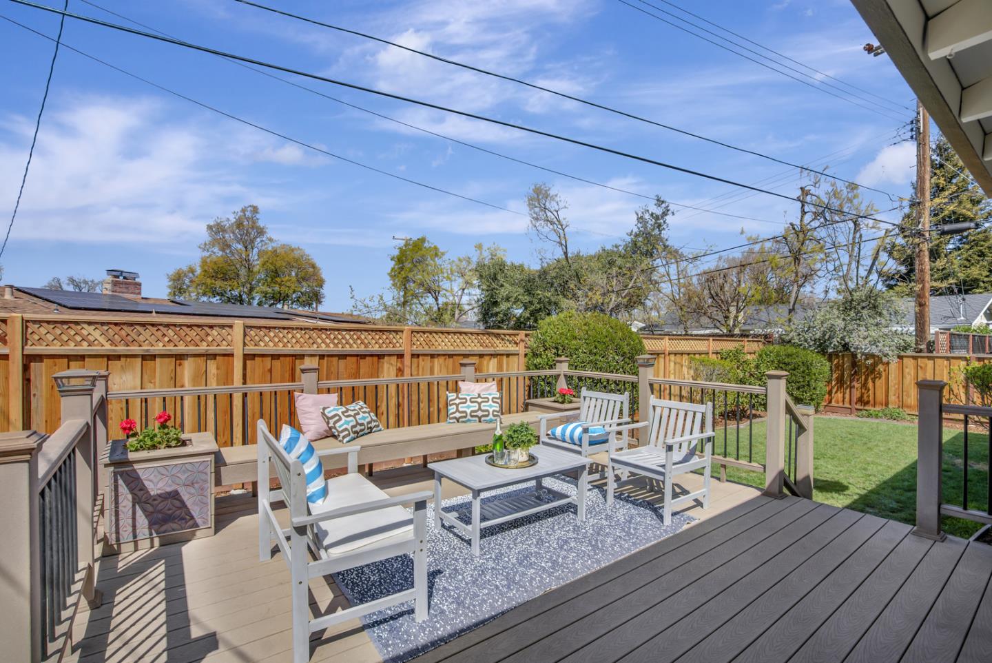 2417 Scanlan Place Santa Clara, CA 95050 - Photo 16 of 22 a balcony with wooden floor outdoor seating and city view