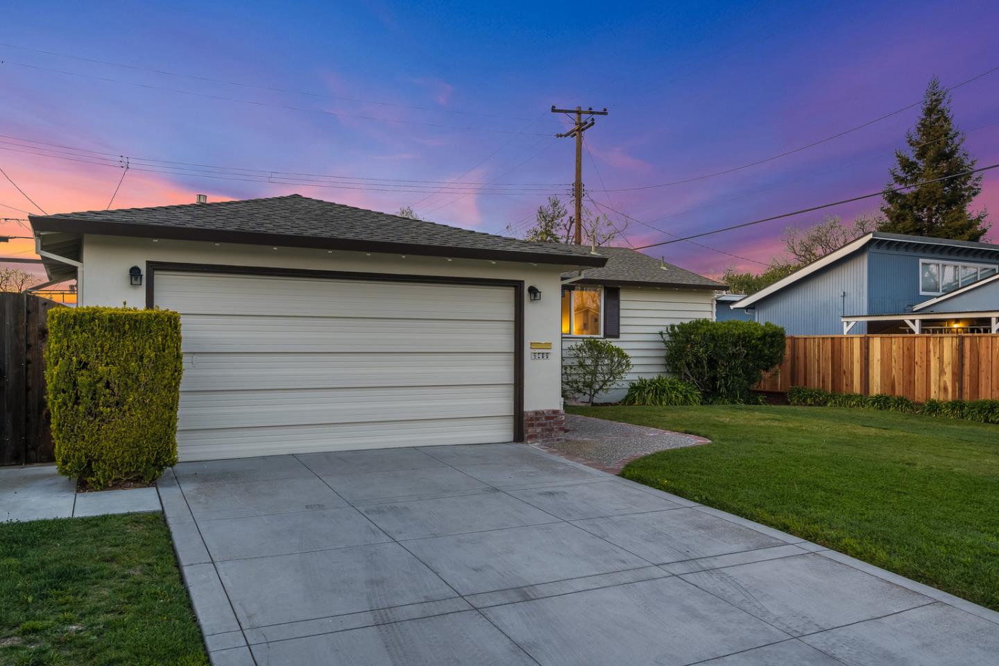 2417 Scanlan Place Santa Clara, CA 95050 - Photo 18 of 22 a front view of a house with a garden