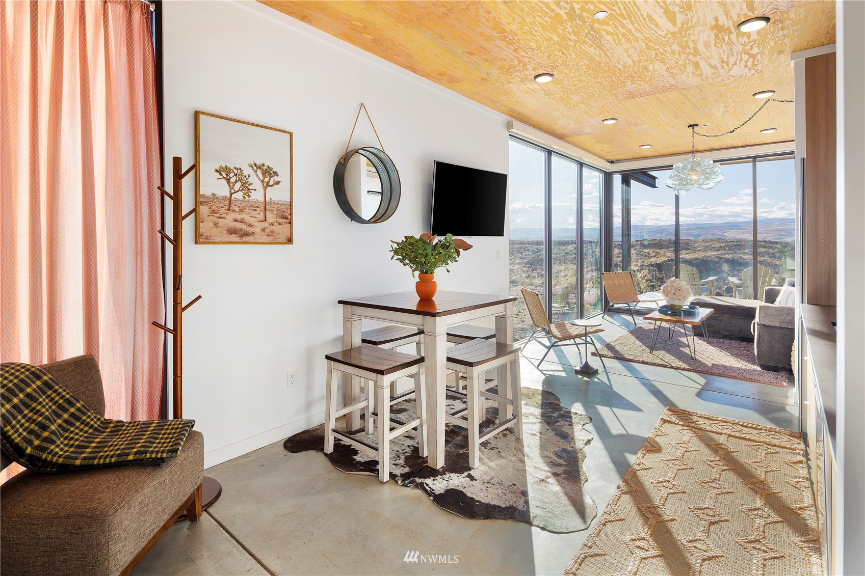 23732 Northwest Cliffe Pointe Road, Unit 1D Quincy, WA 98848 - Photo 11 of 18 a living room with furniture and a window