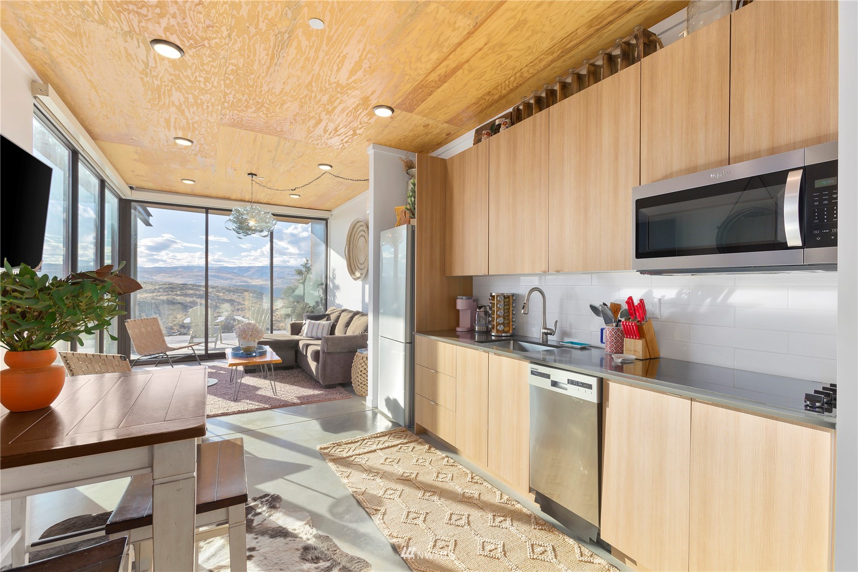 23732 Northwest Cliffe Pointe Road, Unit 1D Quincy, WA 98848 - Photo 2 of 18 a very nice looking living room with a flat screen tv and a window