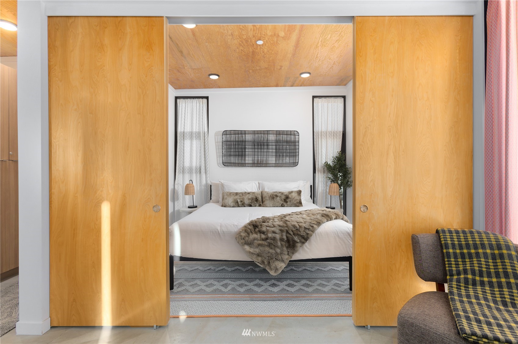 23732 Northwest Cliffe Pointe Road, Unit 1D Quincy, WA 98848 - Photo 8 of 18 a bedroom with a bed and wooden floor