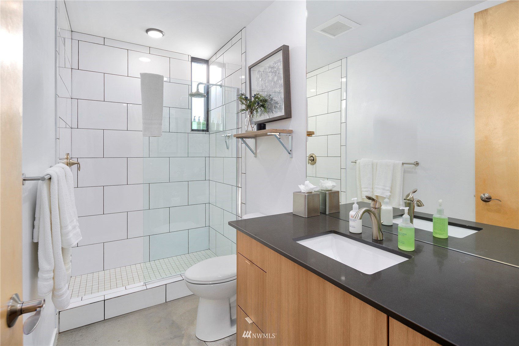 23732 Northwest Cliffe Pointe Road, Unit 1D Quincy, WA 98848 - Photo 9 of 18 a bathroom with a sink a toilet and shower