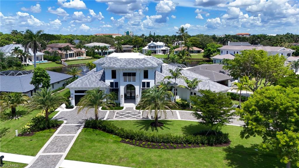 4836 Crayton Road Naples, FL 34103 - Photo 3 of 4 an aerial view of multiple house
