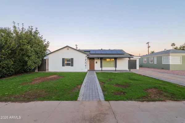 a view of outdoor space yard and front view of a house