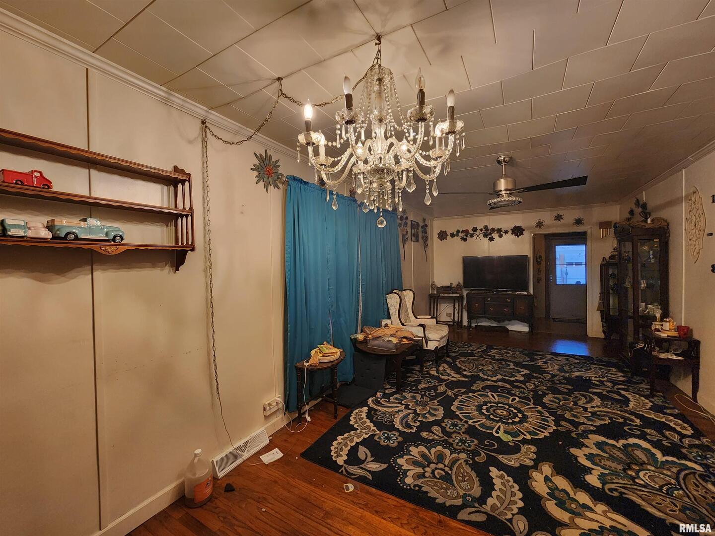 413 North 8th Street Herrin, IL 62948 - Photo 7 of 8 a room with lots of wooden furniture