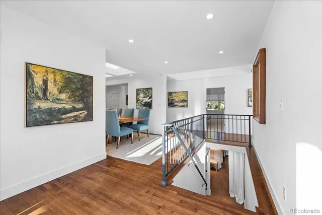 a view of a livingroom with furniture and wooden floor