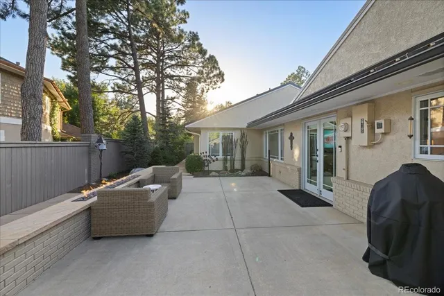 a view of house with outdoor seating