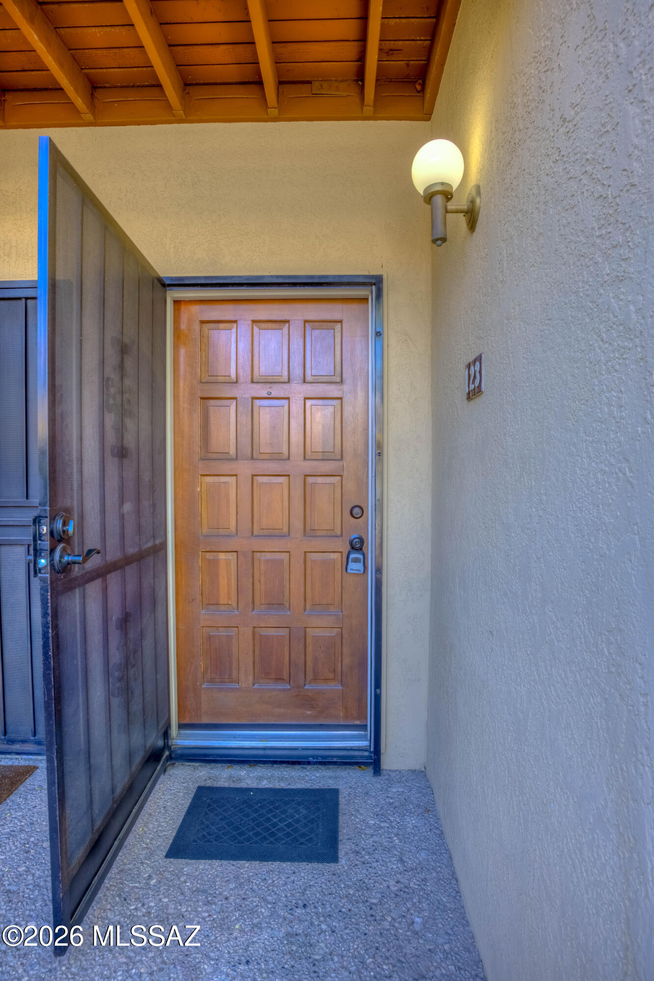 5500 North Valley View Road, Unit 123 Tucson, AZ 85718 - Photo 10 of 36 a view of an empty room with a mirror