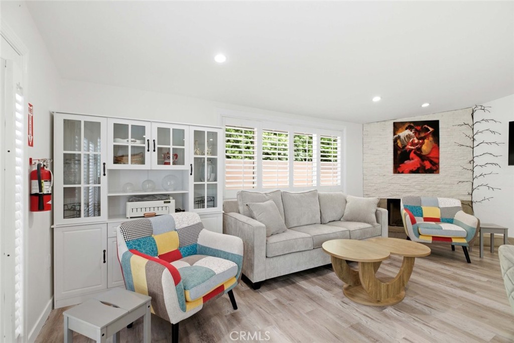 301 West Ashby Street Azusa, CA 91702 - Photo 49 of 75 a living room with furniture and a window