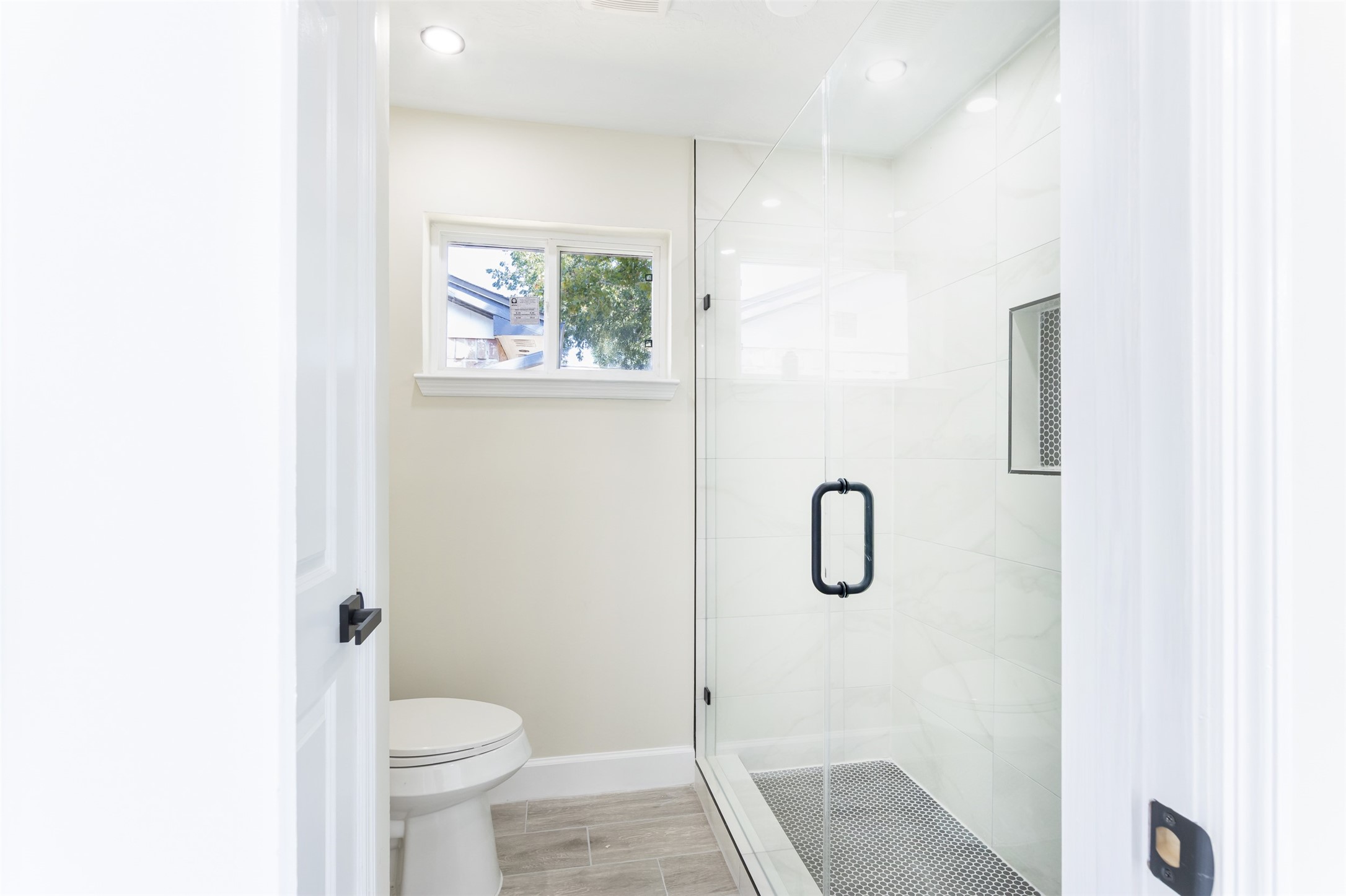 11203 Rousseau Drive Houston, TX 77065 - Photo 25 of 50 a bathroom with a shower